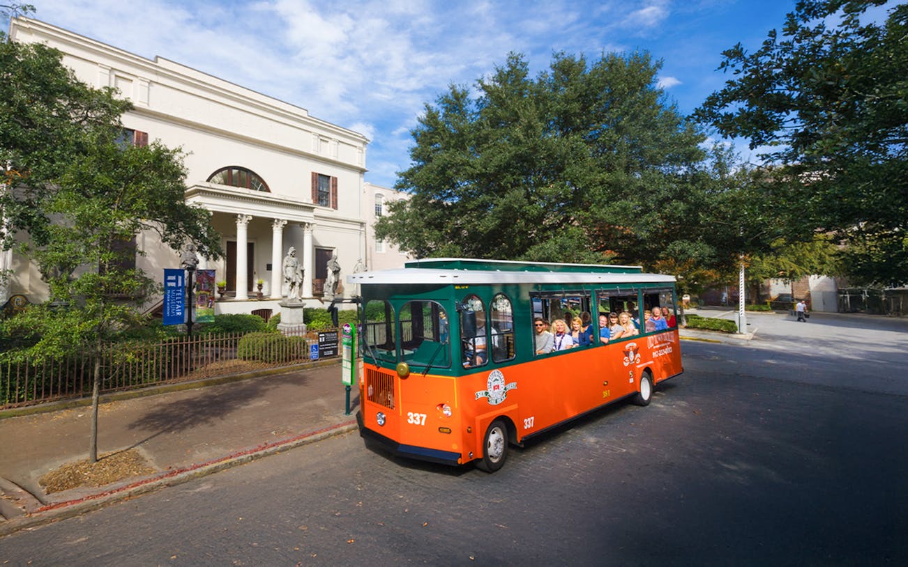 Savannah hop-on hop-off trolley passing Telfair Museum.