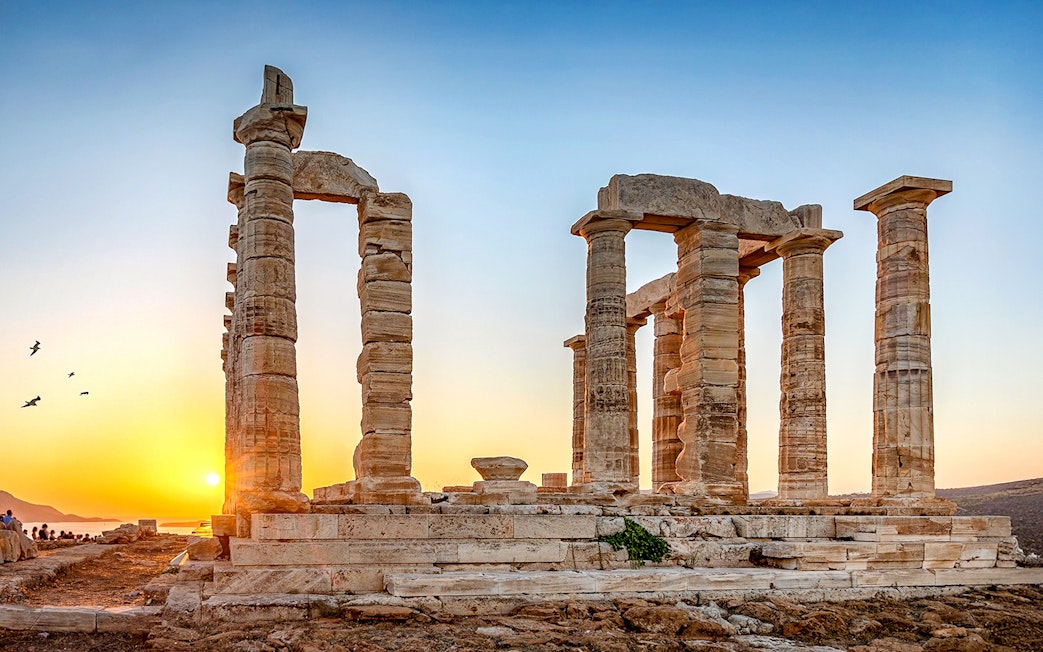 Temple of Poseidon at sunset, Cape Sounion, Greece.
