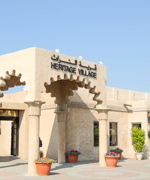 Heritage Village entrance in Dubai on a half-day sightseeing tour.