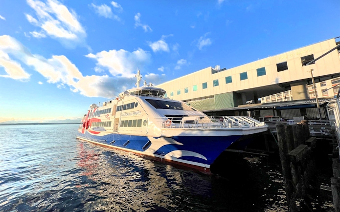 High-speed ferry docked in Seattle, WA, with views of Puget Sound, en route to Victoria, BC.