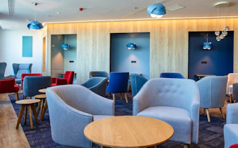 Plaza Premium Lounge seating area at Budapest International Airport Terminal 2B.