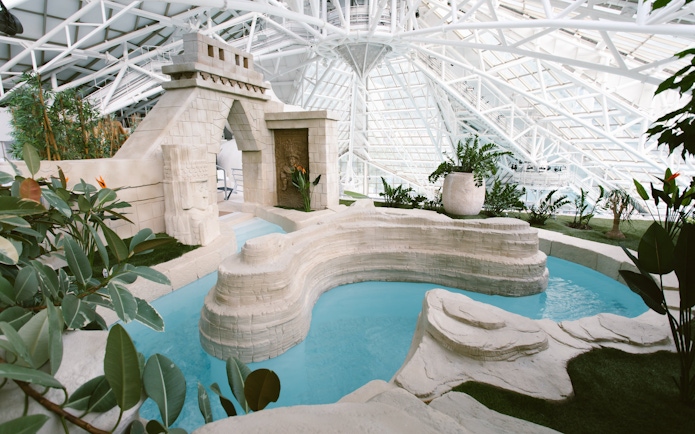 Aztec-themed bath in the Origins spa area at Caldea thermal center, Andorra.