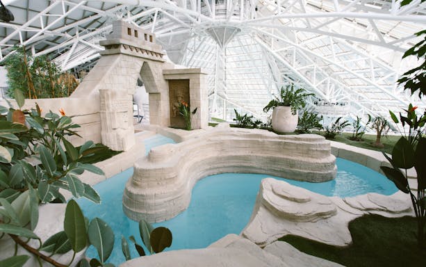 Aztec-themed bath in the Origins spa area at Caldea thermal center, Andorra.