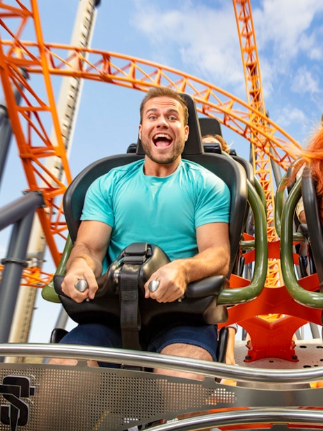 People enjoying a roller coaster ride at Dreamworld.