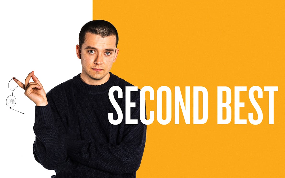 Man holding broken glasses with "Second Best" text on orange background.