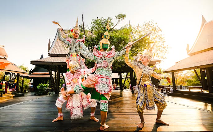 Traditional dancers performing in Mallika City, 1905 A.D., showcasing cultural heritage.
