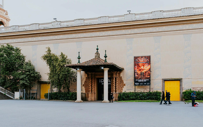 IDEAL Barcelona entrance with Pompeii exhibition poster.