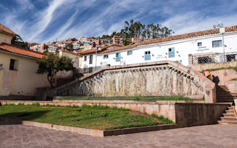 San Blas Square in Cusco, Peru, featuring stone steps and colonial architecture.