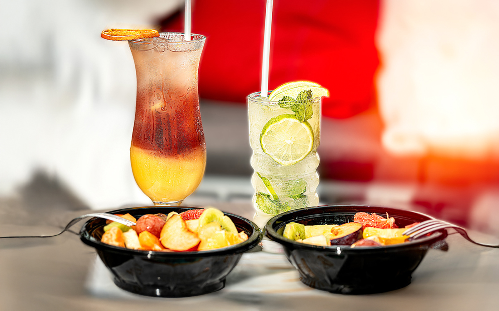 Fruit salad bowls and cocktails inside Szechenyi Bath Palm House.