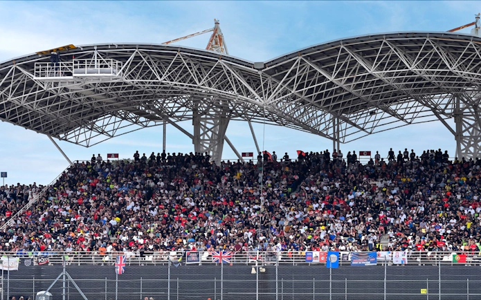 Crowd in grandstand at Formula 1 Grand Prix, Sepang, Malaysia.