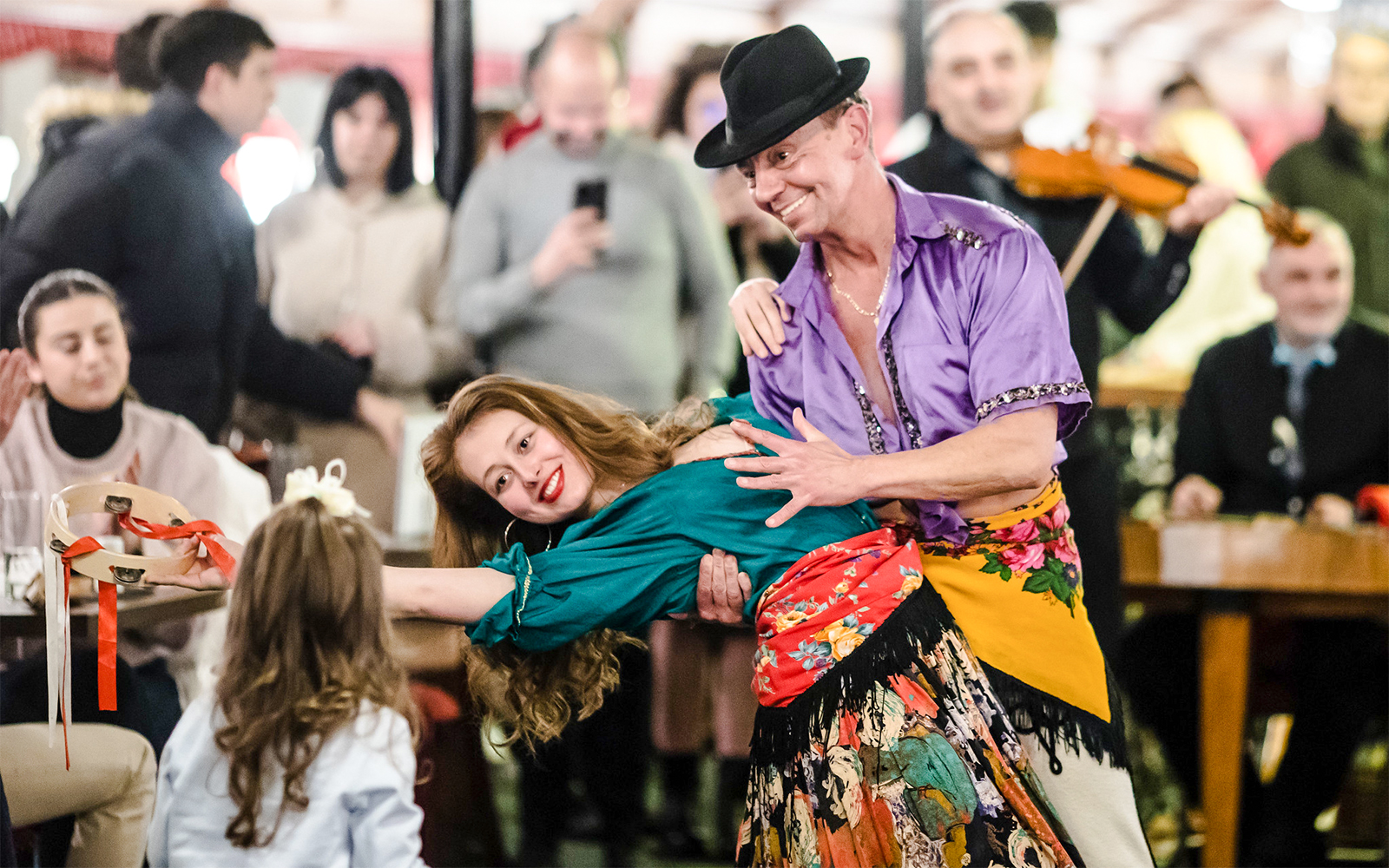 Rajk Folk Orchestra performance on Danube sightseeing dinner cruise at night.