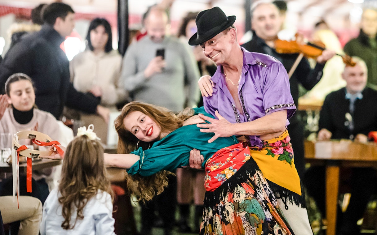 Rajk Folk Orchestra performance on Danube sightseeing dinner cruise at night.