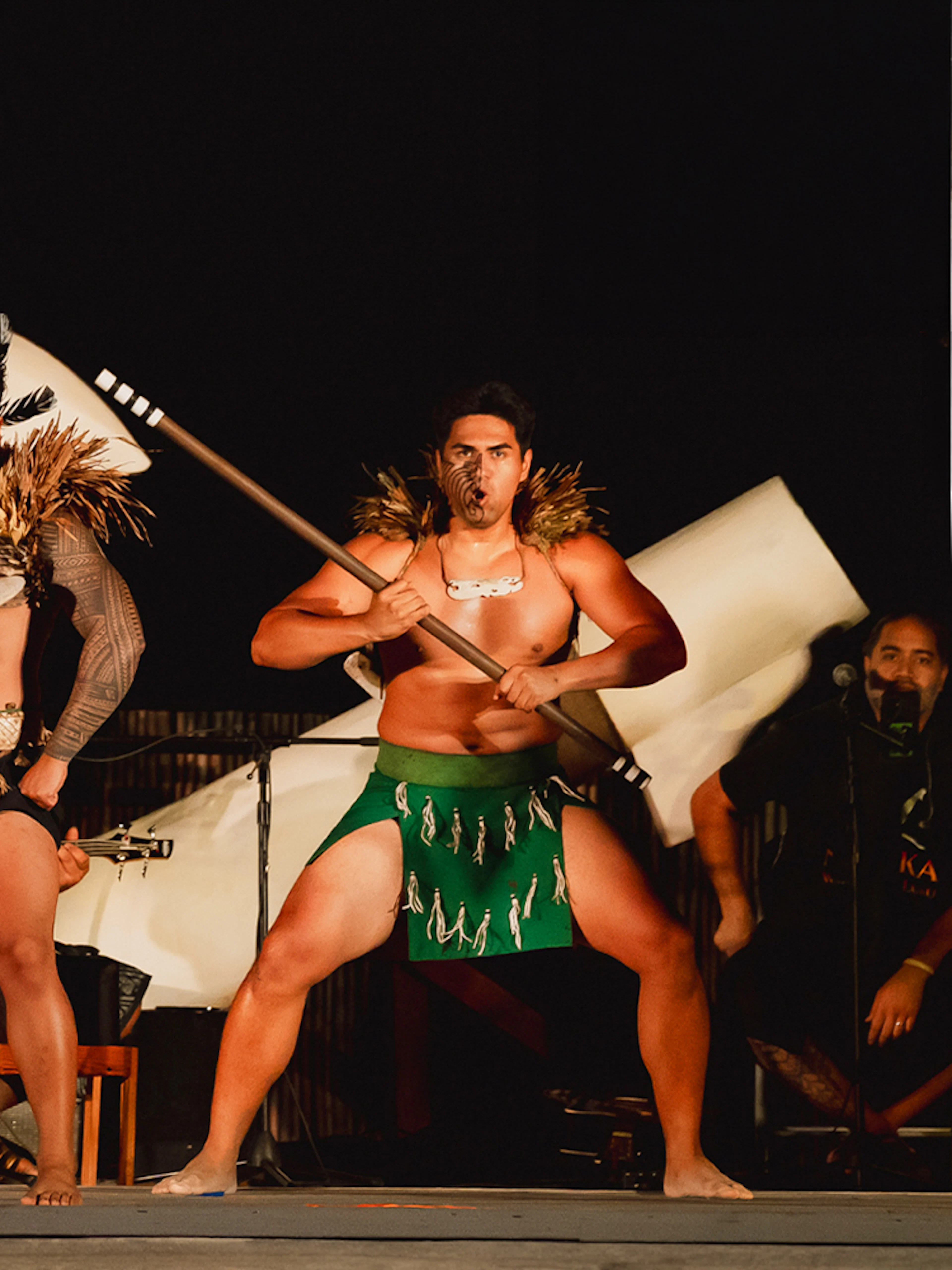 Traditional Polynesian dancers performing at Mauka Warriors Luau, Hawaii.