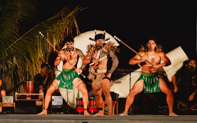 Traditional Polynesian dancers performing at Mauka Warriors Luau, Hawaii.