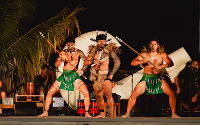 Traditional Polynesian dancers performing at Mauka Warriors Luau, Hawaii.