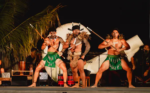 Traditional Polynesian dancers performing at Mauka Warriors Luau, Hawaii.