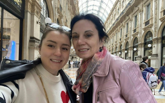 Two people inside Galleria Vittorio Emanuele II, Milan, during a self-guided city exploration game.