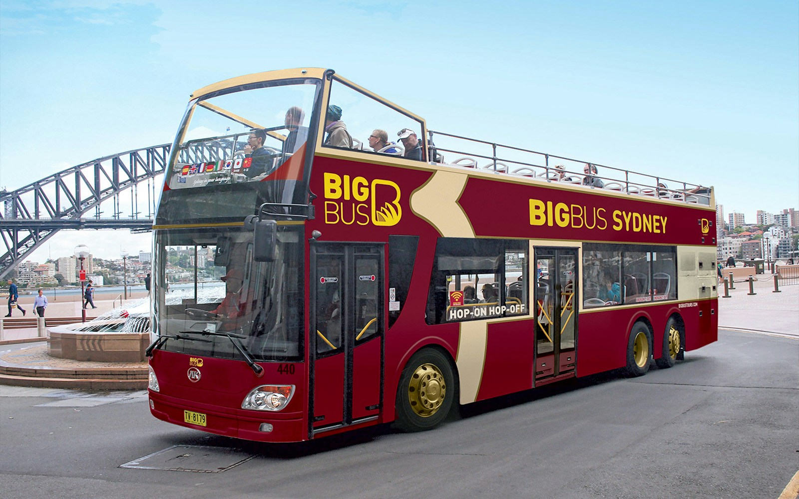 Big Bus Sydney tour with Sydney Harbour Bridge in the background.