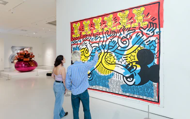 Guests viewing colorful pop art at Moco Museum London.
