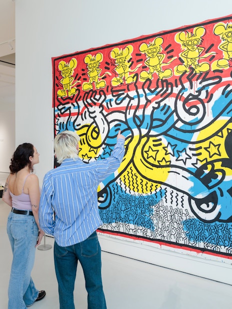 Guests viewing colorful pop art at Moco Museum London.