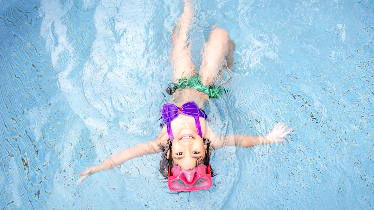 Child enjoying a swim at Wild Wild Wet water park.