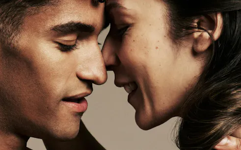 Close-up of two ballet dancers in an intimate pose, Australian Ballet Romeo and Juliet.