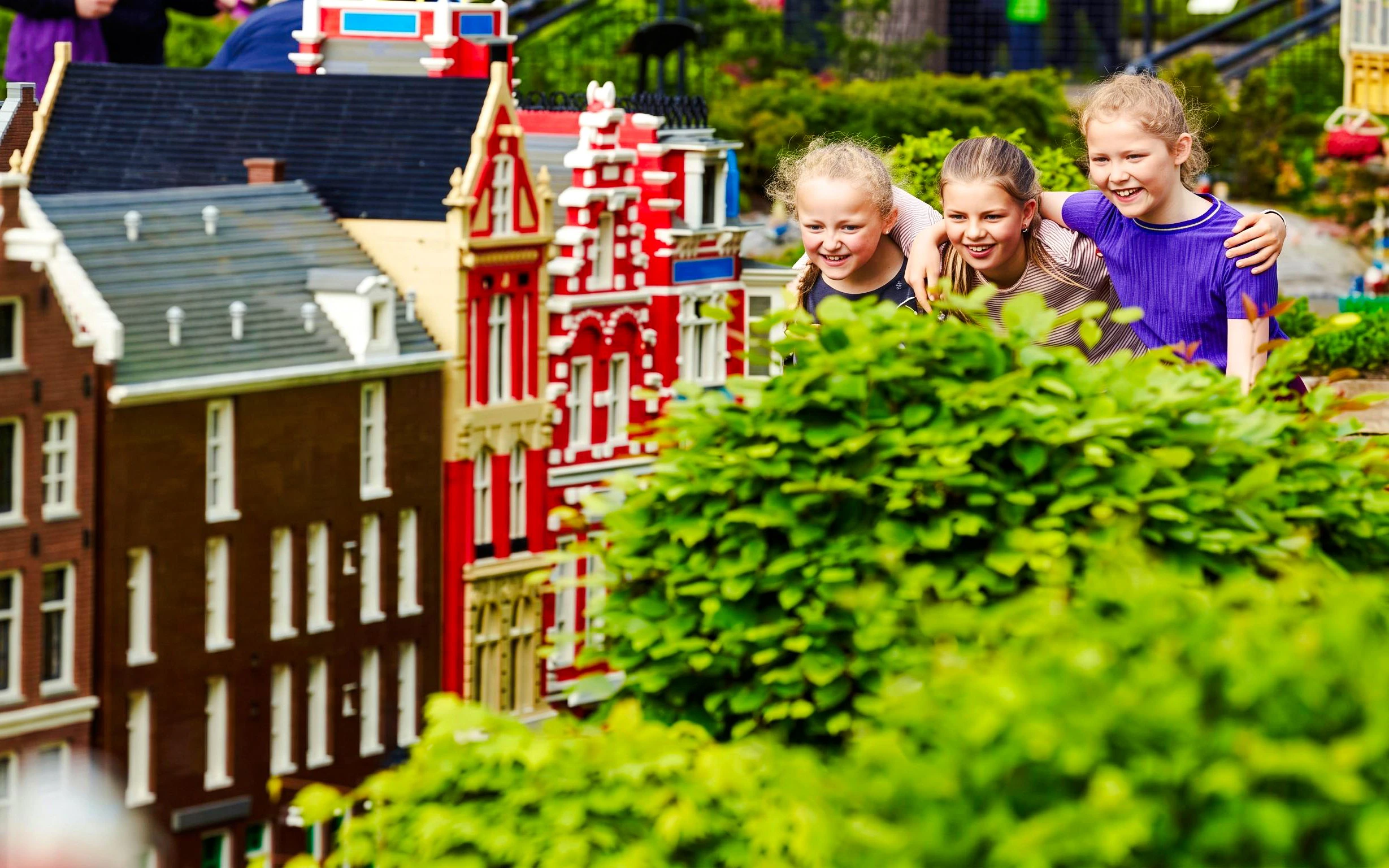 Children exploring LEGO buildings at LEGOLAND Miniland.