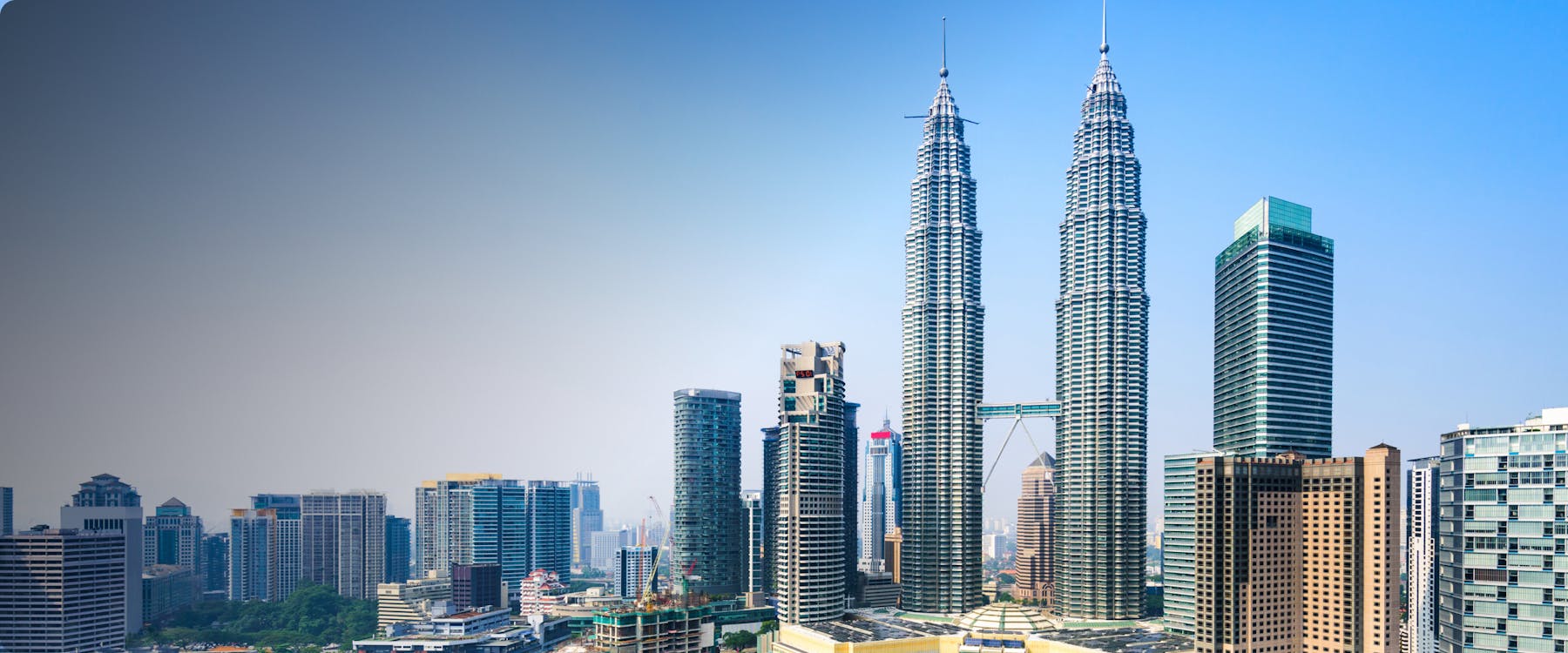 Petronas Twin Towers in Kuala Lumpur city skyline.