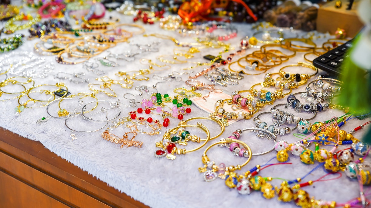 Handcrafted jewelry display at Monti Urban Market, Rome.