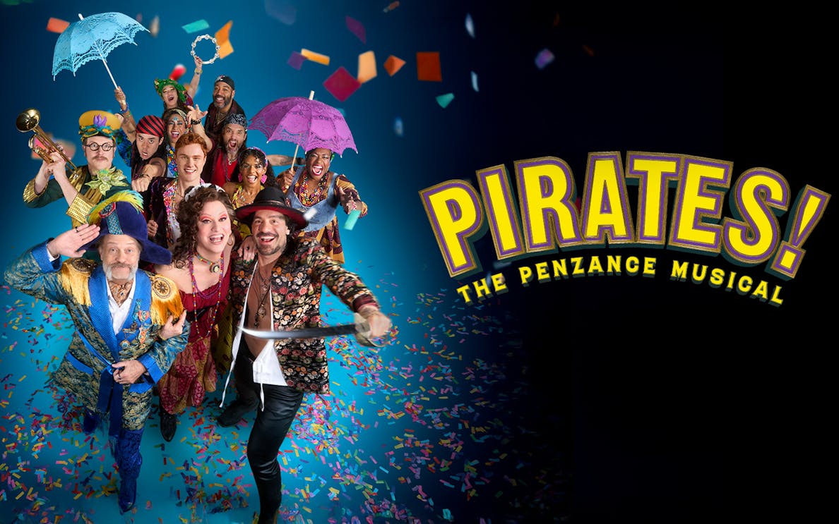 Cast of Pirates! The Penzance Musical in colorful costumes with confetti and props.