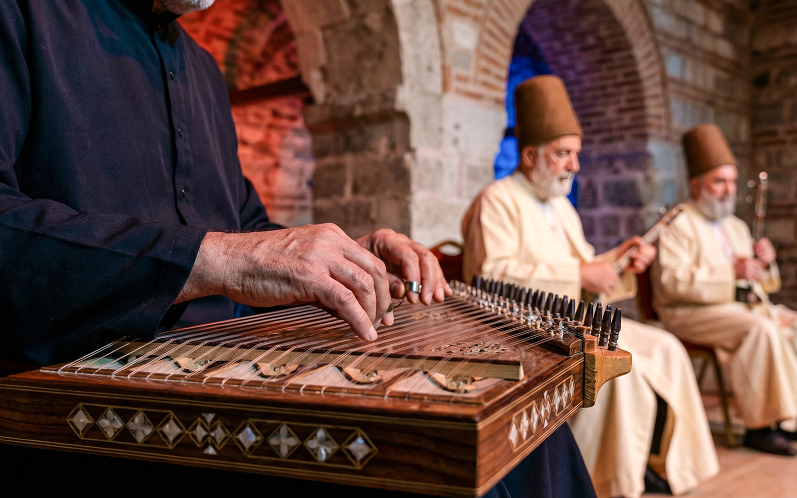Musicians playing traditional instruments at a Whirling Dervish show.