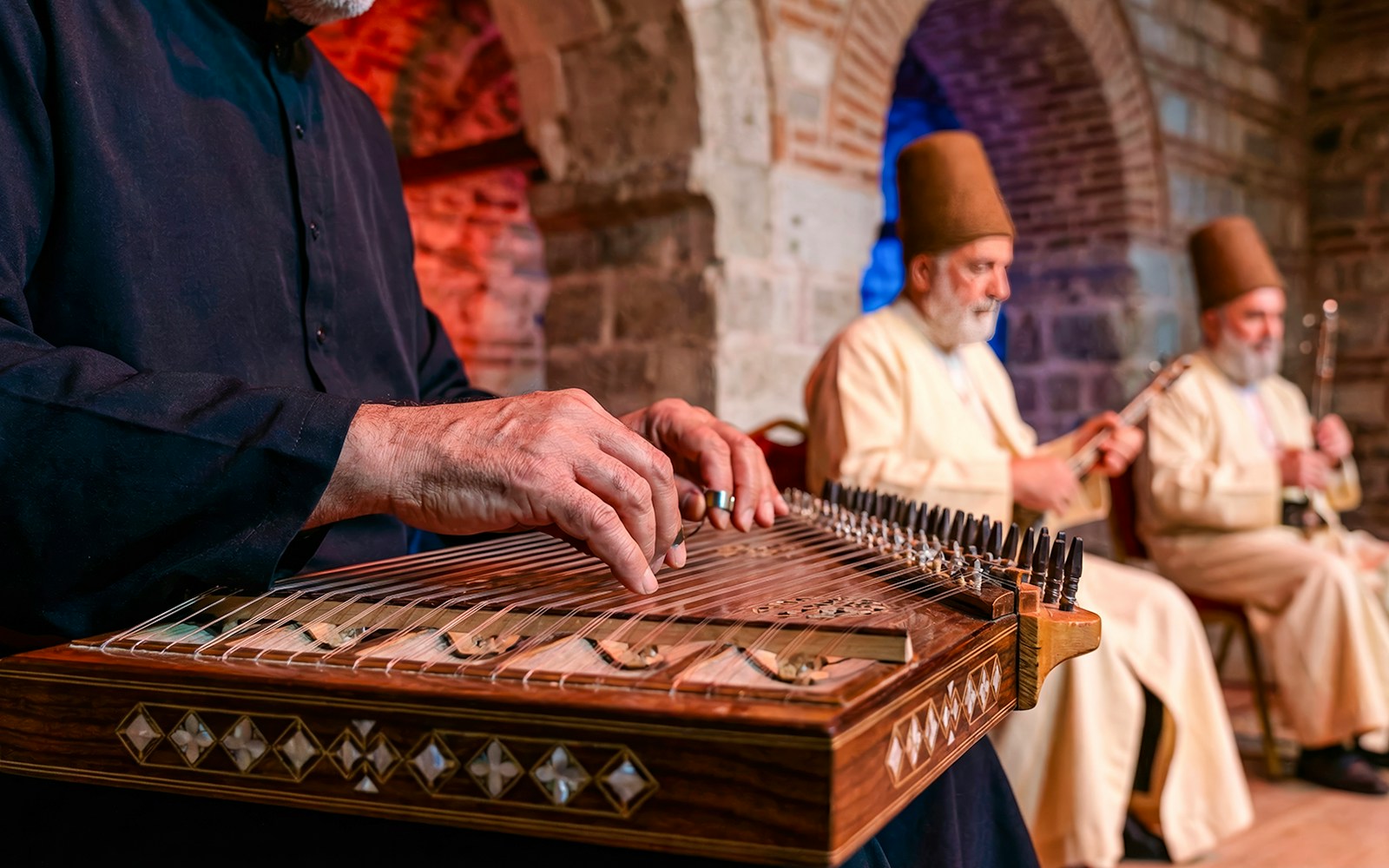 Musicians playing traditional instruments at a Whirling Dervish show.
