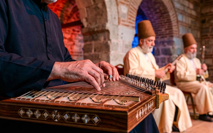 Musicians playing traditional instruments at a Whirling Dervish show.