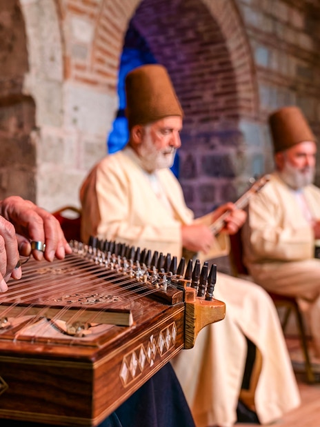 Musicians playing traditional instruments at a Whirling Dervish show.