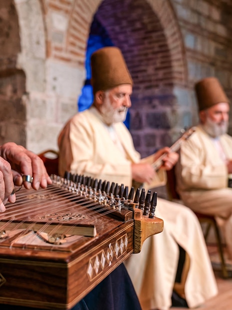 Musicians playing traditional instruments at a Whirling Dervish show.
