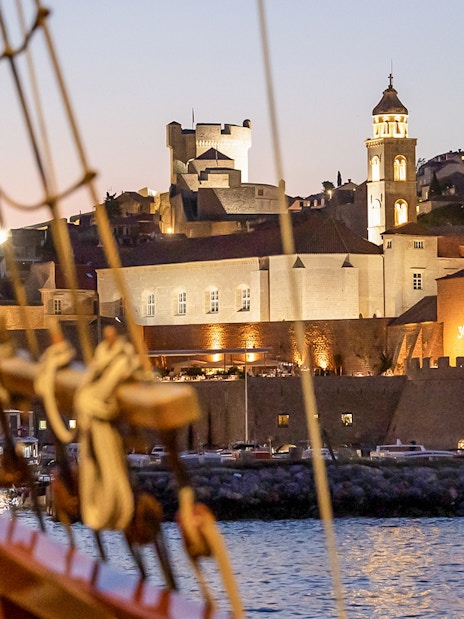 Dubrovnik old town view from Karaka Ship during sunset cruise.