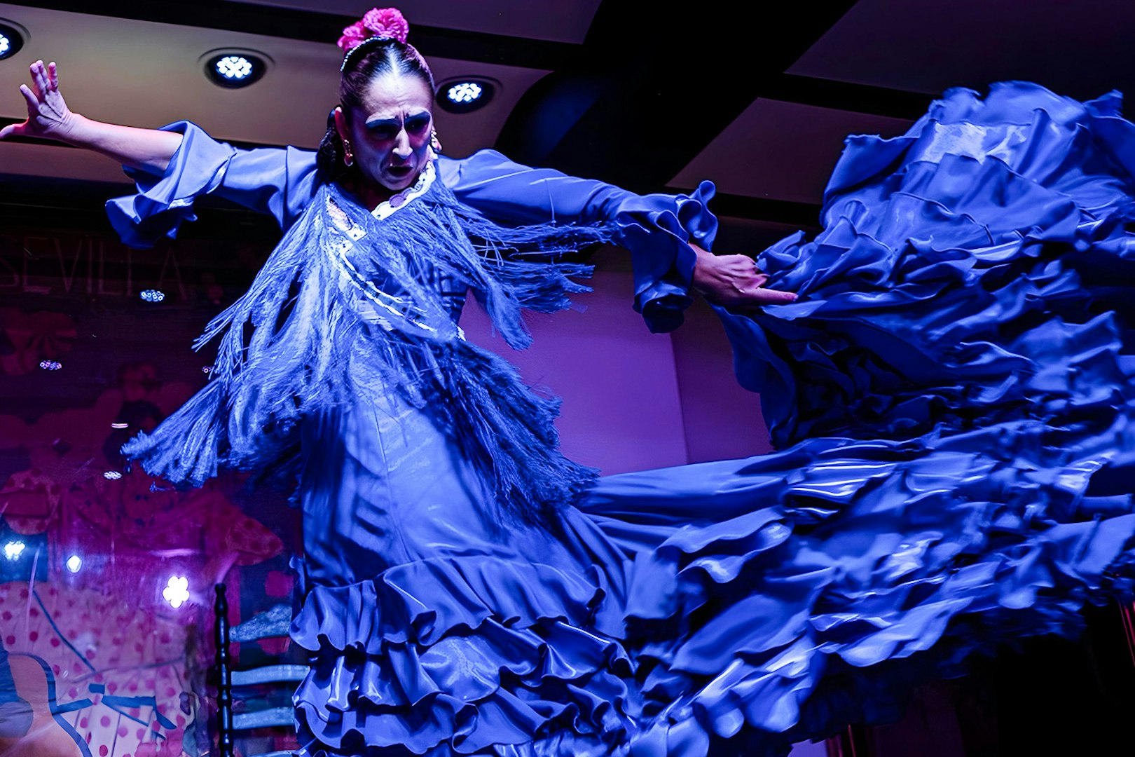 Flamenco dancer performing at Tablao El Arenal in Seville, Spain.
