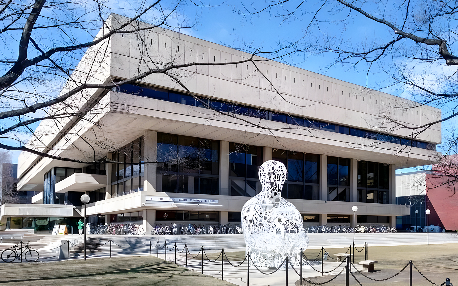 Stratton Student Center in Cambridge, Boston with sculpture and bicycles in front.