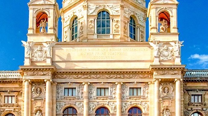 Kunsthistorisches Museum Vienna facade with ornate architecture and dome.
