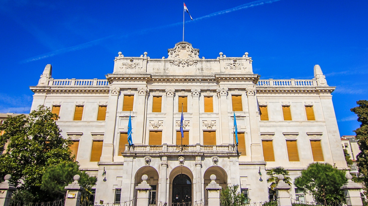 Croatian Maritime Museum building with flags in Split, Croatia.