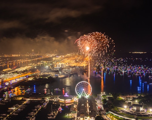 Fireworks over Bayfront Park and Marina in Miami during night celebration.