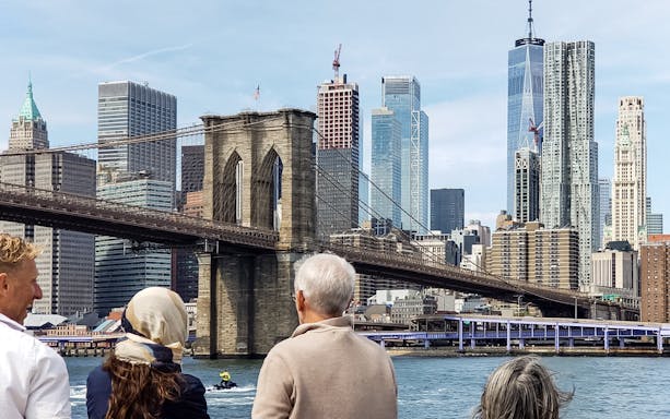 Brooklyn Bridge and Manhattan skyline viewed from 60 Mins Lady Liberty Cruise.