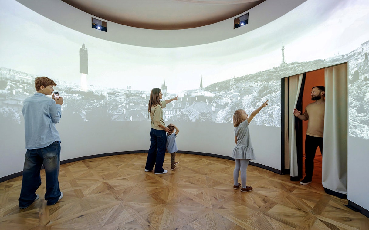 Guests exploring exhibits inside Praga Magica Interactive Exhibition.