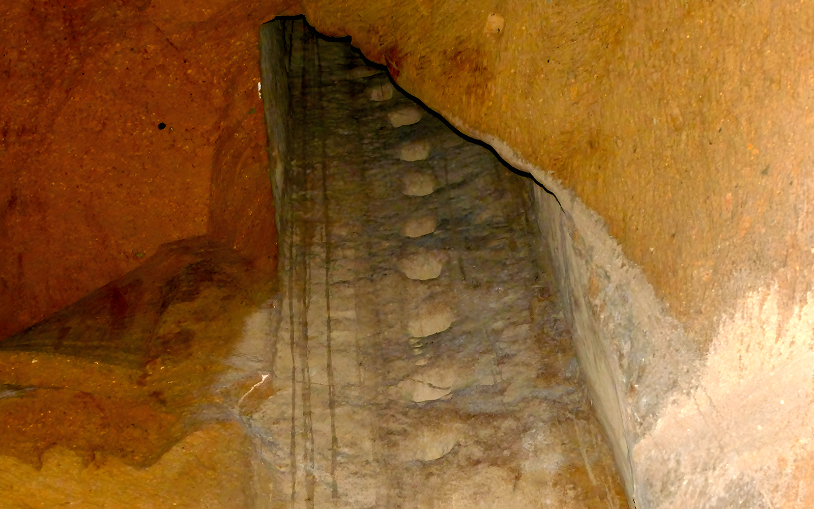 Ancient stone staircase inside LAPIS Museum, Naples, Italy.