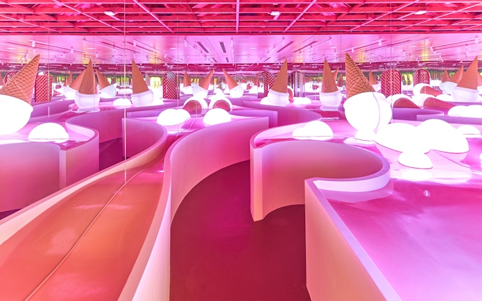Ice cream-themed room with pink slides at Museum of Ice Cream Singapore.