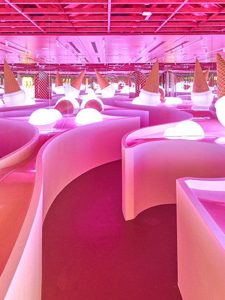 Ice cream-themed room with pink slides at Museum of Ice Cream Singapore.