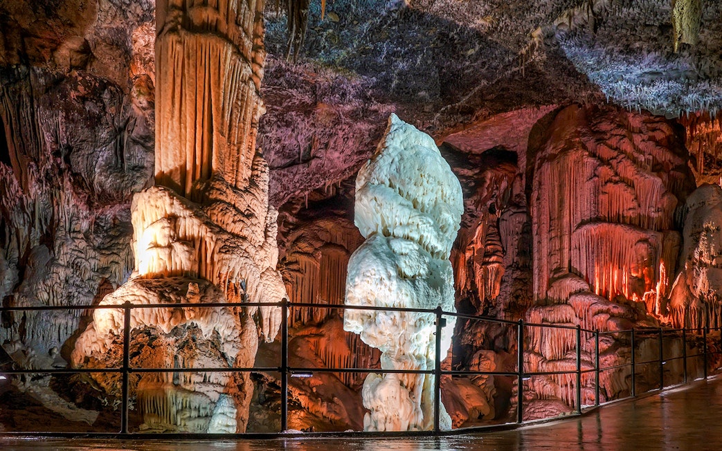 Stalactites and stalagmites inside Postojna Cave, Slovenia.