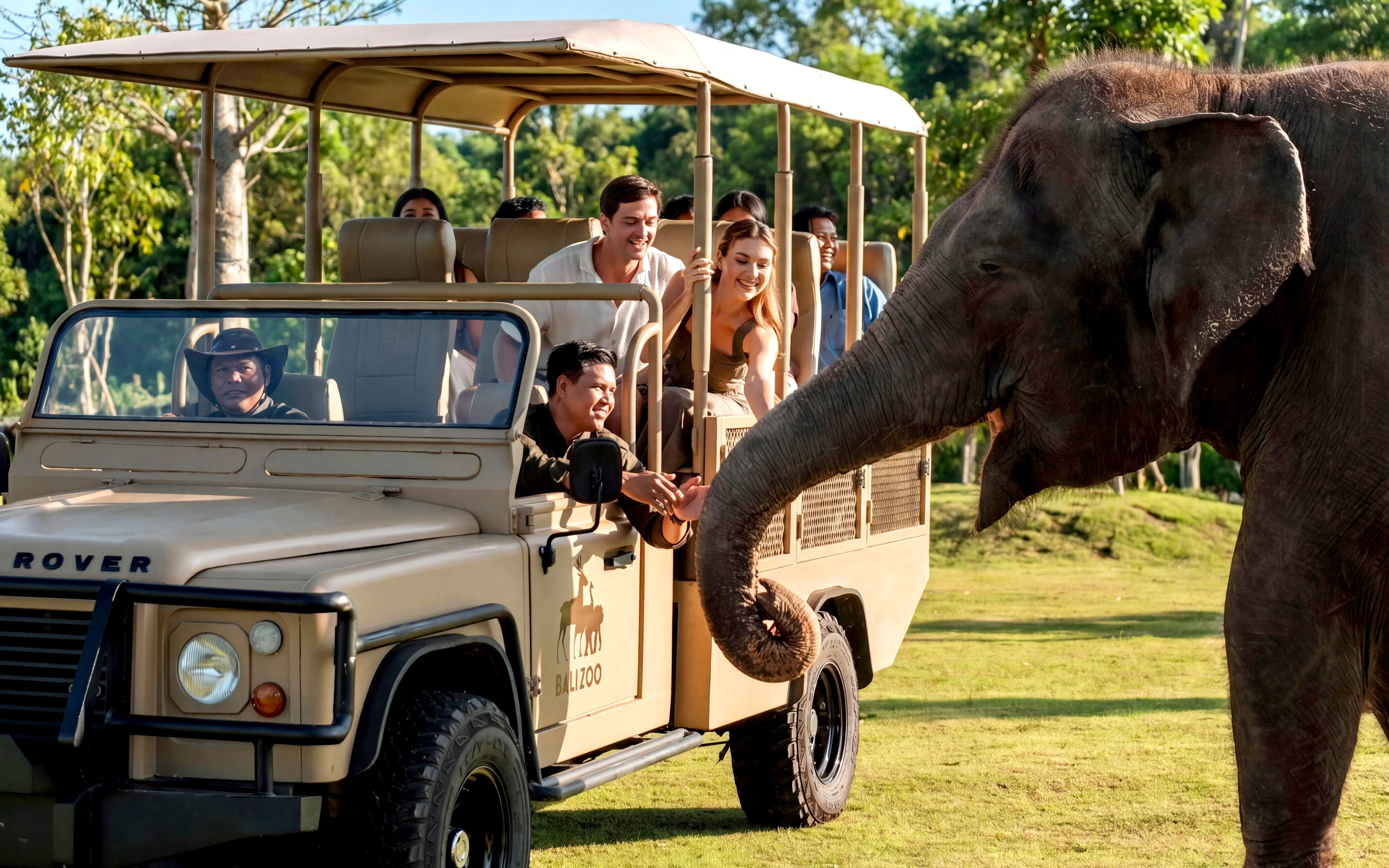 Tourists in a safari vehicle interacting with an elephant on the Elephant Explorer Bali tour.