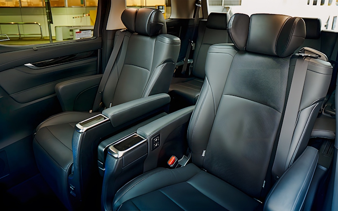 Luxury interior of private car for airport transfer with leather seats.