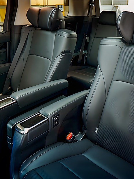 Luxury interior of private car for airport transfer with leather seats.